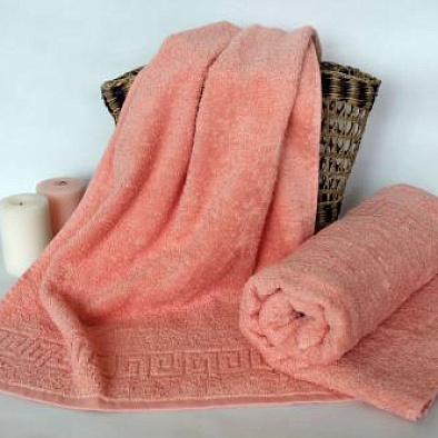 Махровое полотенце для ванной розовое